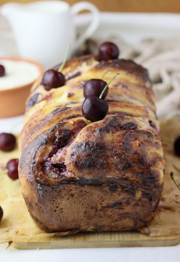 image of baked cherry cheese babka loaf